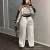 Tuta pantalone con maglione girocollo a fantasia stampata con lettere da donna, nuova tendenza autunno e inverno, tuta casual alla moda