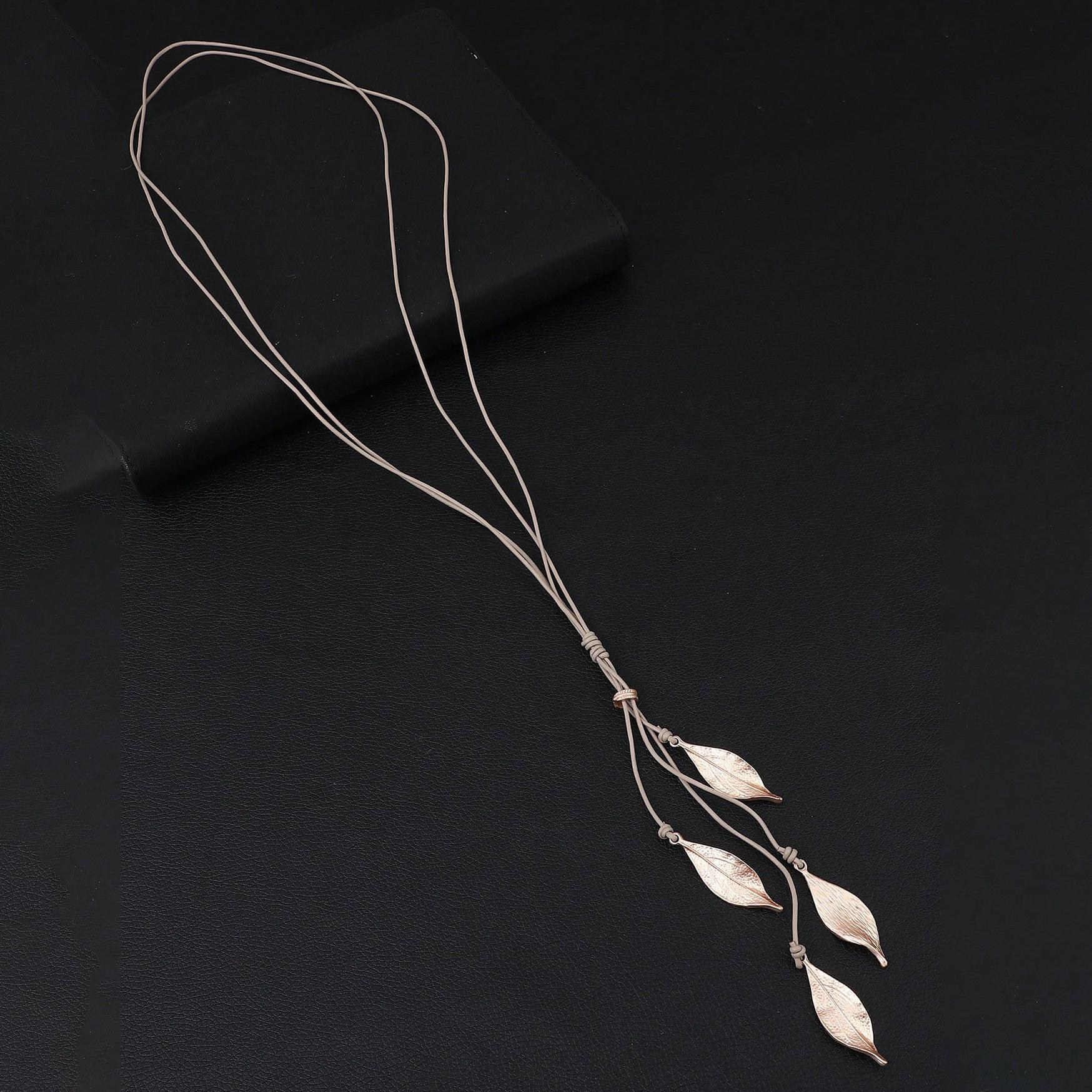 

Новая кисточка с подвеской в виде листа, женская персонализированная цепочка-свитер из сплава в форме листа с веревкой из коровьей кожи, универсальная