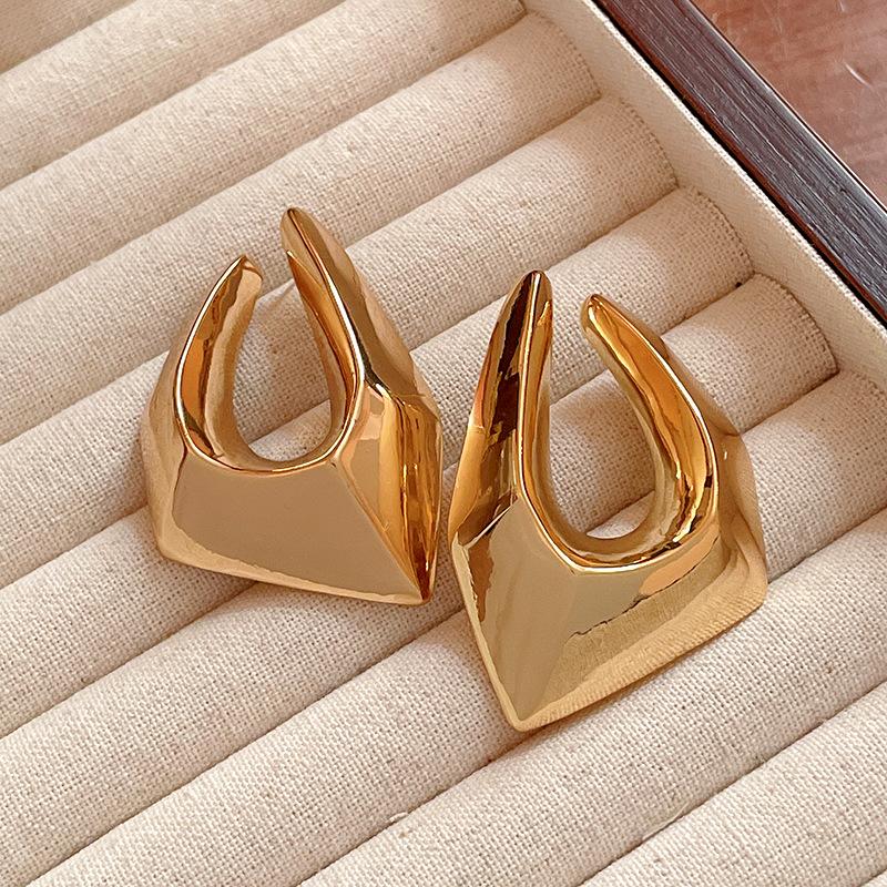 

Real gold electroplated silver needle irregular geometric stud earrings European and American fashion exaggerated earrings individual wind jewelry