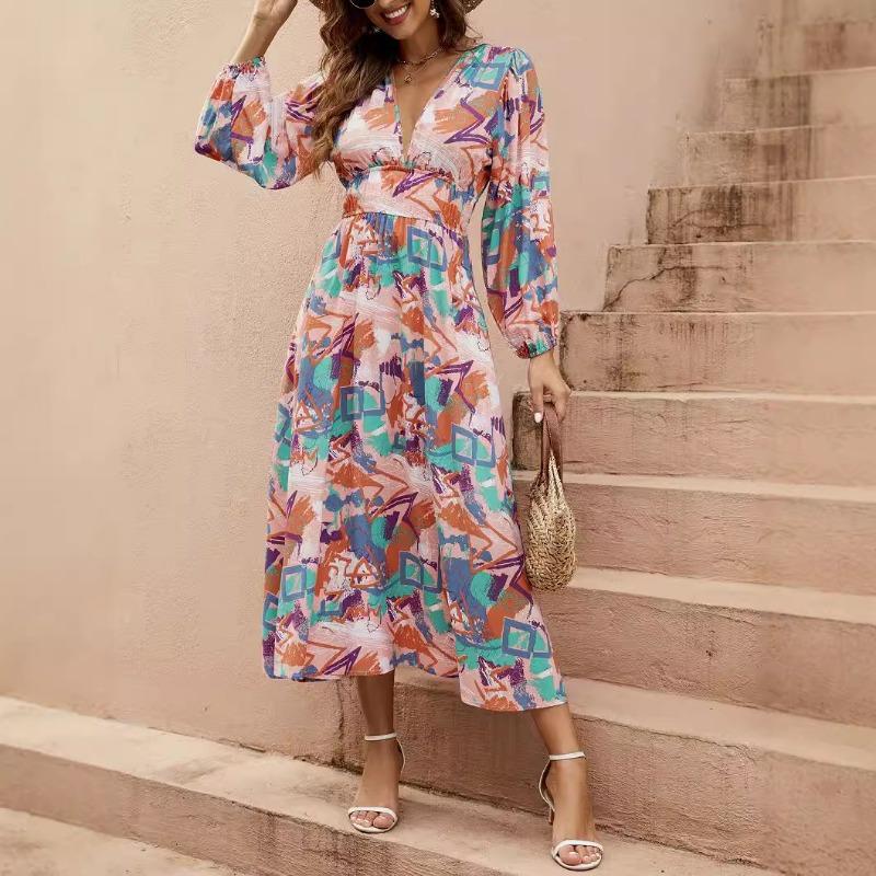 Damska sukienka swingowa z nieregularnym geometrycznym nadrukiem, głębokim dekoltem w serek, talią, długim rękawem typu lampion