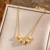 Women's Korean Style Lucky Bead Titanium Steel Necklace - Elegant Gold Bean Beads with Carved Surface Clavicle Chain Jewelry.