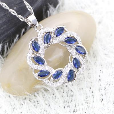 Collana con ciondolo rotondo con pietre blu per regalo di compleanno da donna