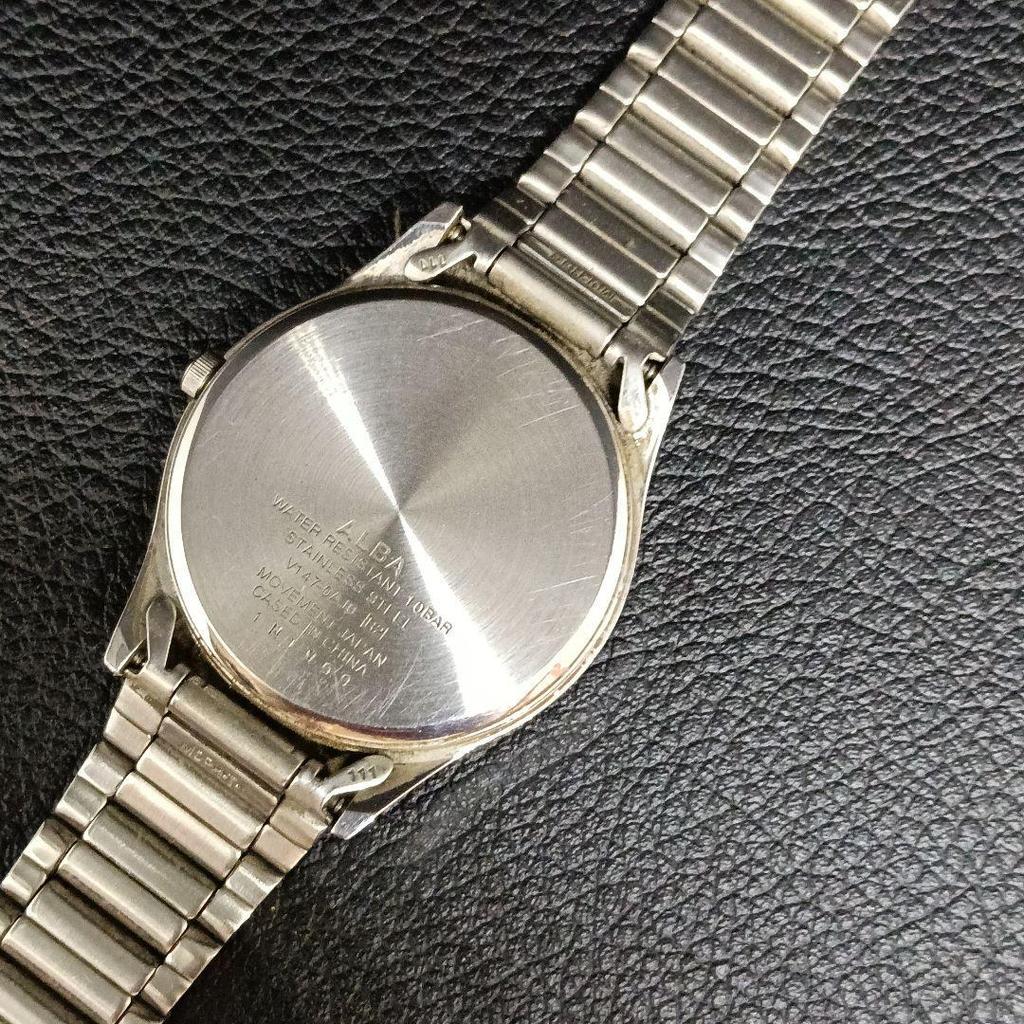 Used Working condition: ALBA men's wristwatch, solar-powered, date display, 10 bar water resistant