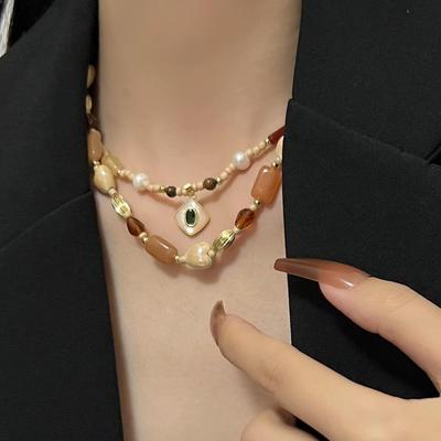 Retro-Perlen-Halskette für Damen im Herbst und Winter, kleine Menschenmenge, geschichtetes Halsketten-Design, unregelmäßiges Halsketten-Zubehör