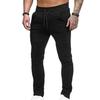 Pantalon de survêtement respirant couleur unie cordon de serrage taille élastique pantalon skinny d'extérieur pour la salle de sport