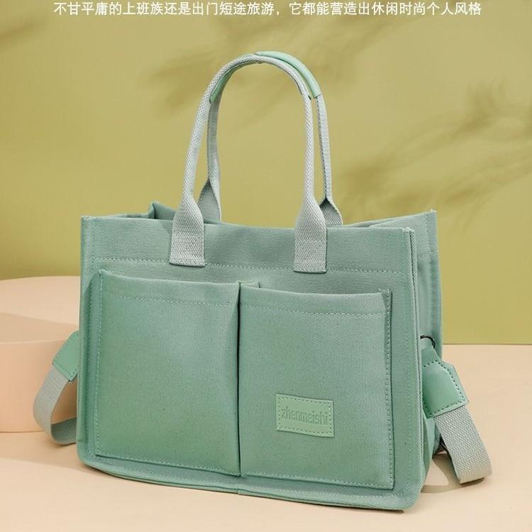 Canvas bag women's large-capacity multi-pocket shoulder bag lady hand-held tote bag