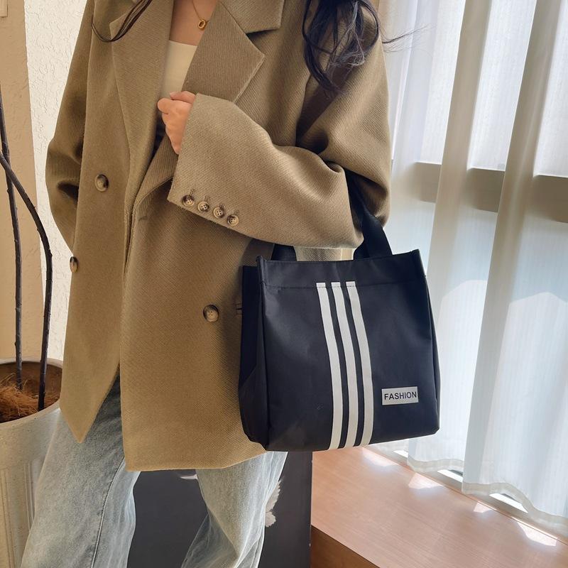 

New trend simple sports style casual handbag office workers students lightweight large capacity handbag чёрный