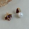 Fashion and novel oil drop flower diamond leaf earrings warm pearl pendant design niche gorgeous high-end stud earrings