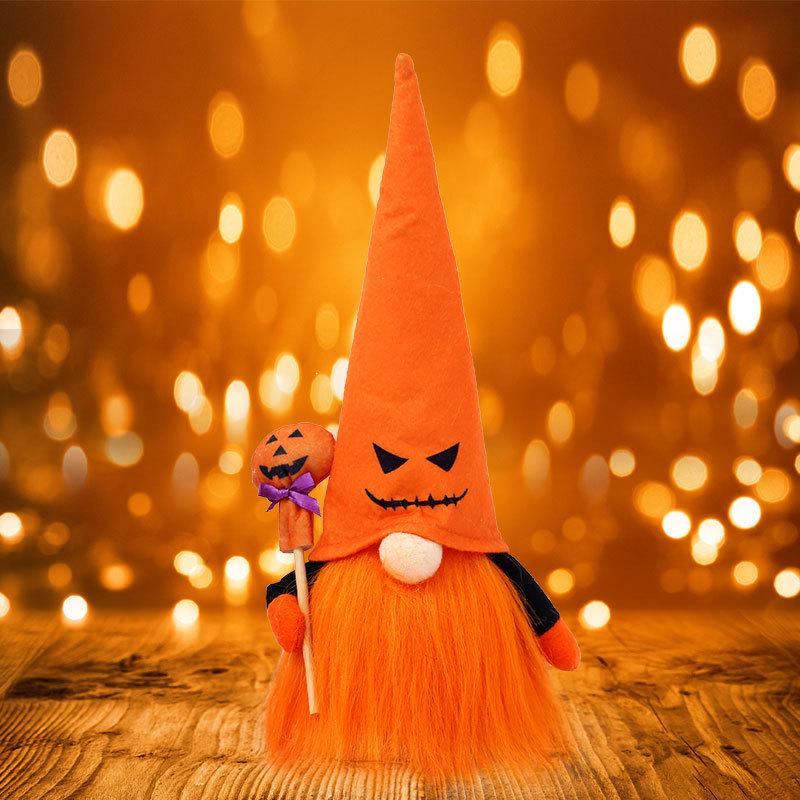 Luminous Ghost Face Halloween Doll Figurine with Rudolph Pendant for Window Display.