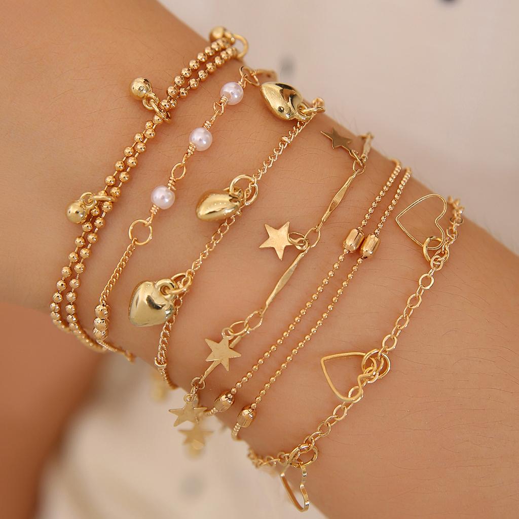 Hot-selling creative pieces inlaid with rhinestones, twists, imitation pearls and other multi-shape bracelet sets, women's stacked jewelry
