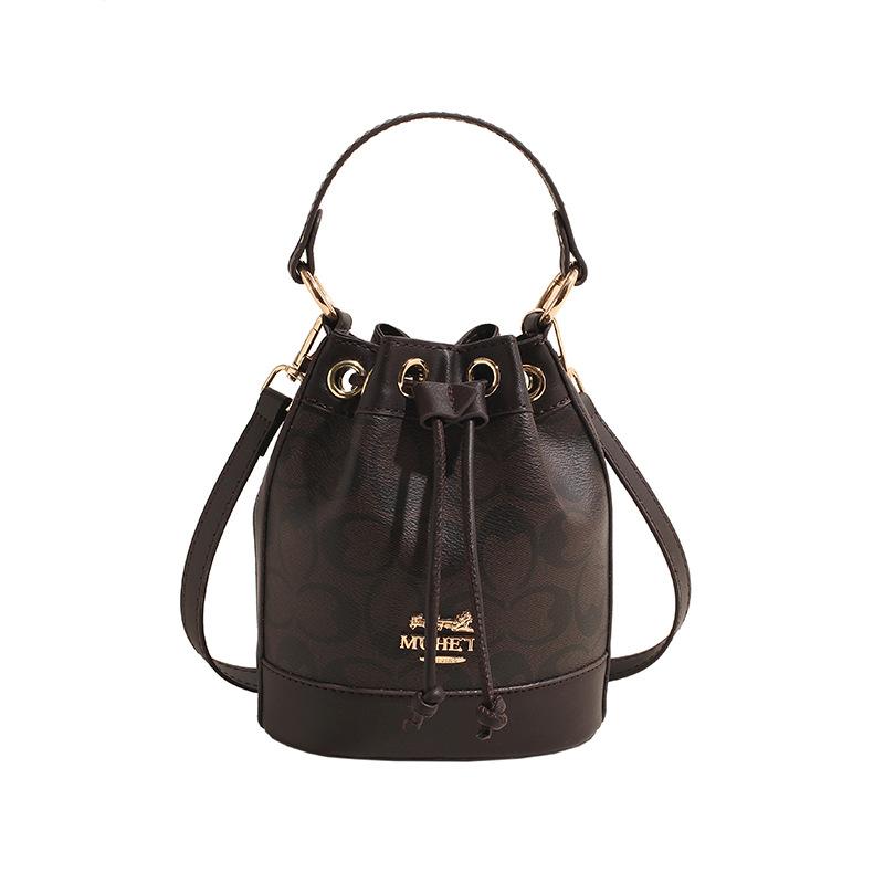 Ms. Baos nye allsidige messengerbag, bærbar bøtteveske.