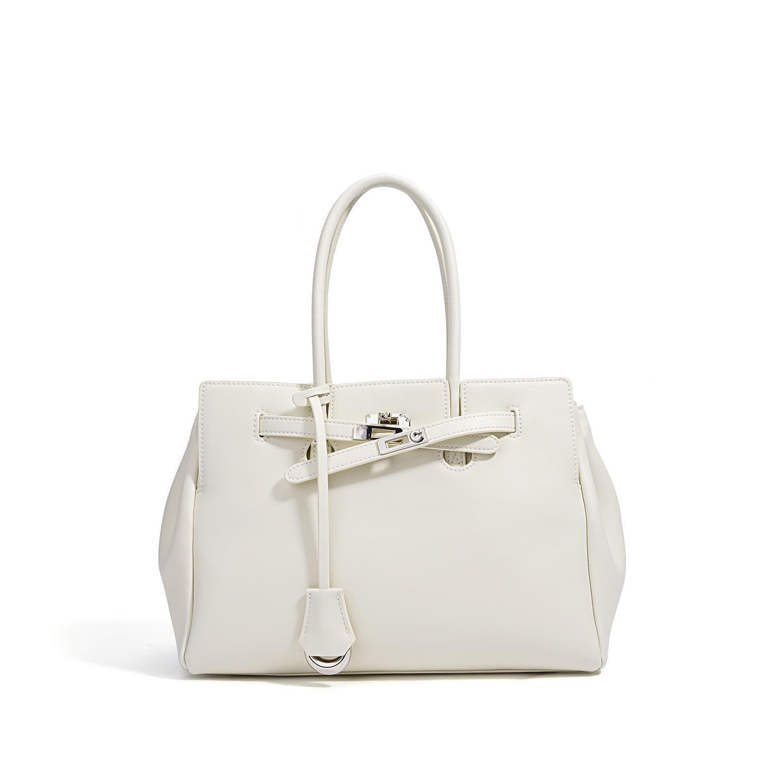 

Женская новая сумка-тоут большой вместимости, портативная кожаная, для通勤, универсальная, нишевая женская сумка бежевый