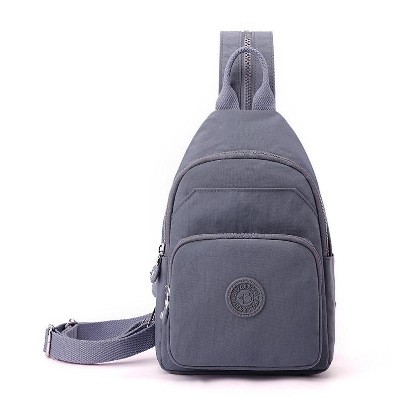

Autumn nylon cloth zipper new unisex bag simple fashion breast bag multi-purpose backpack