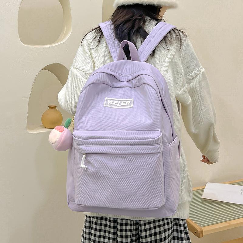 Student backpack Women's new large-capacity outdoor lightweight schoolbag Middle school student candy-colored backpack