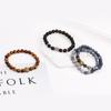 European & American Lava Stone Tiger's Eye Bracelet with Golden Lion Head for Men