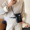 Foreign style simple key pearl buckle bucket bag French style 2025 spring and summer new shoulder messenger mobile phone bag female