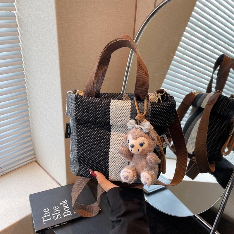 Personality trend casual simple texture bucket bag fashion 2025 summer new foreign style women shoulder messenger bag