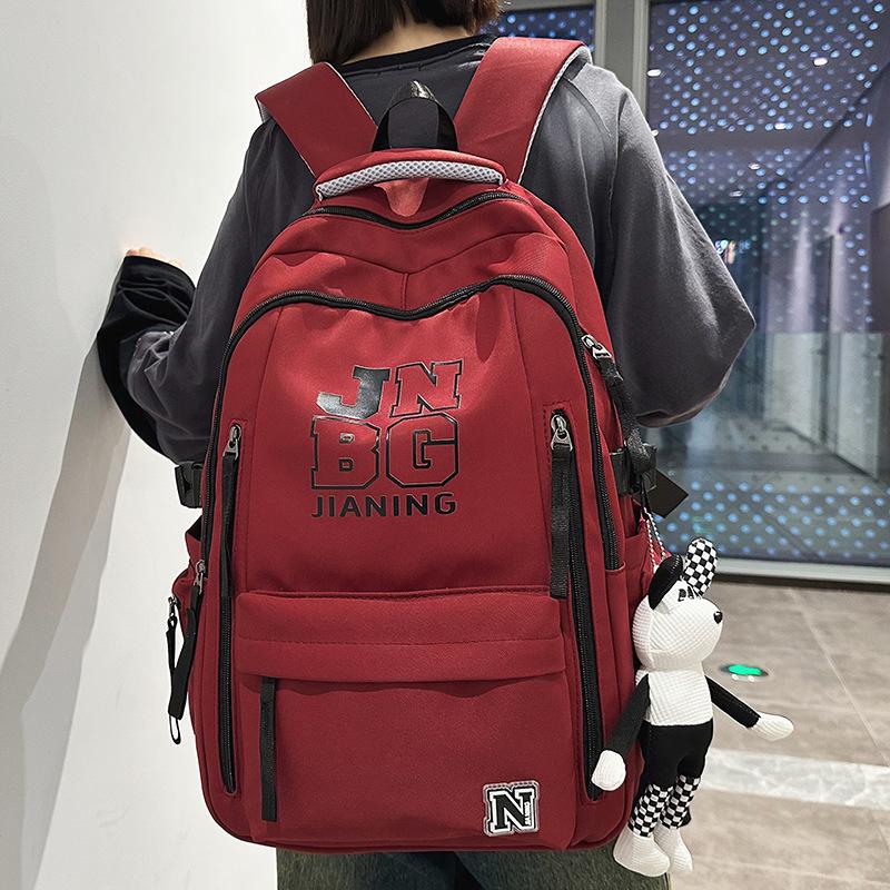 Children's Schoolbags Elementary School Students  Girls  Junior High School Students  Dirty Resistant Men's Large Capacity Letter Backpack