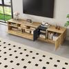 A modern TV stand in contrasting colors. With a simple, high-contrast design. With open compartments and cable openings. 200 cm