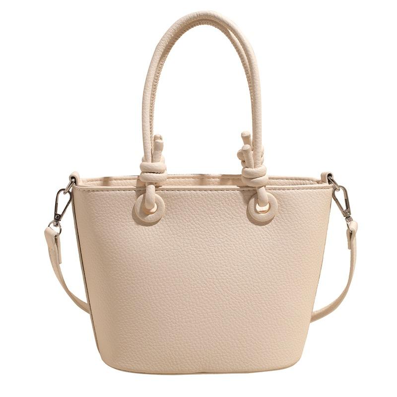 Wholesale hot sale high quality casual lychee pattern solid color portable bucket bag versatile simple wind commuter messenger bag women