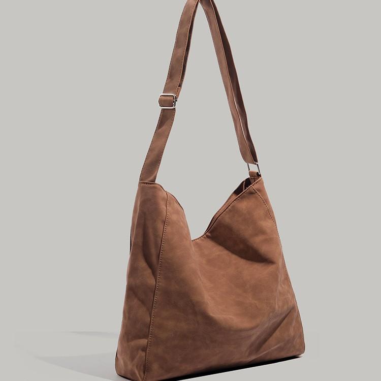 New tote bag with a high-end feel, single-shoulder crossbody bag, niche fashion versatile large-capacity vintage bucket bag for women