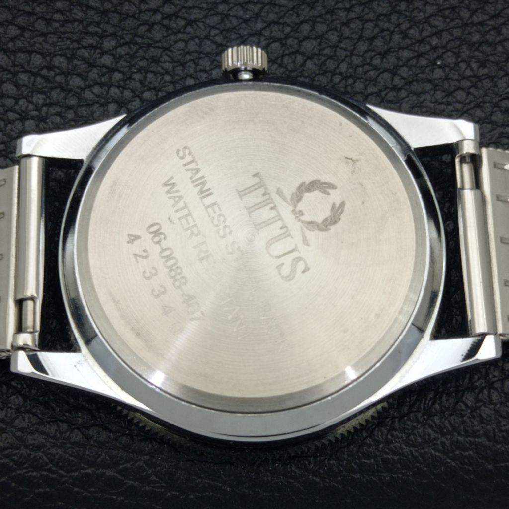 KÄSIÜLESKEERATAV VINTAGE TITUS SWISS MEESTE PÖÖRLEV BEZEL MUSTA NUMBRILAUAGA KELL a700261-5 R202-a700261