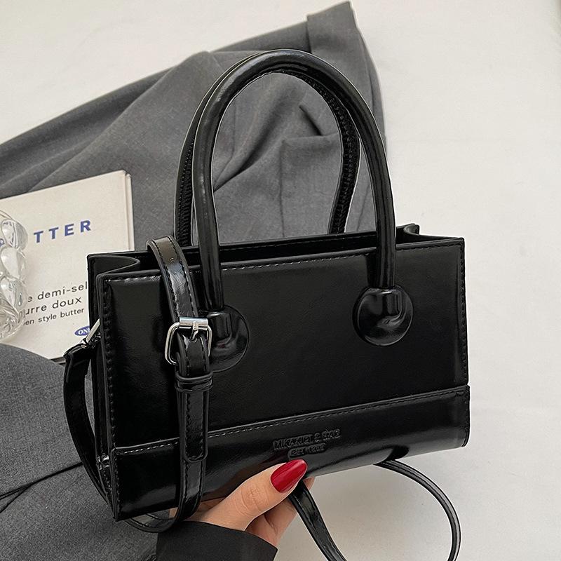 Wholesale Popular Niche Simple Temperament High Sense Portable Small Square Bag Women's Fashion Versatile Work Commuter Messenger Bag