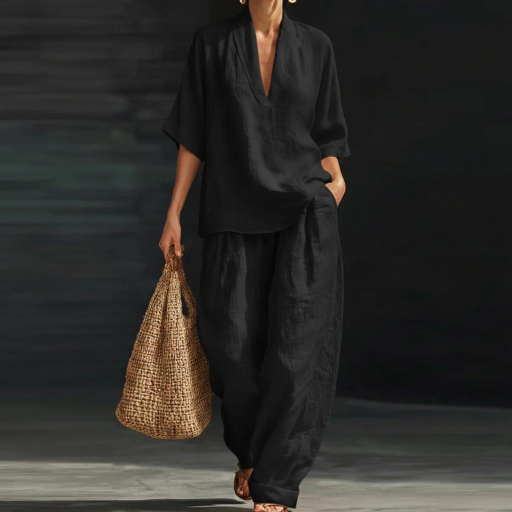 Damset med V-ringad pullovertopp och lös midja, avslappnad