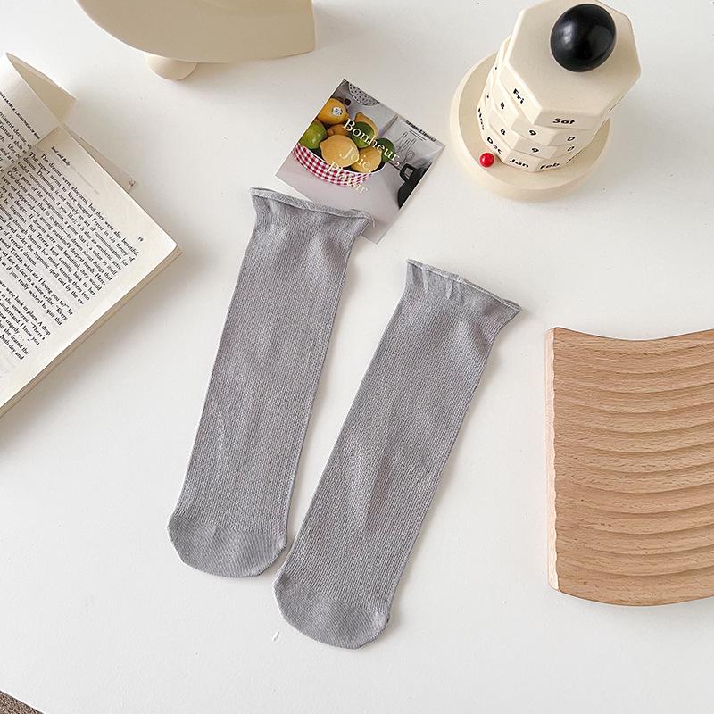 Women's Mid-Calf Socks: Autumn/Winter Maternity Loose-Fit, Solid Color, Trendy Spring Pile Socks in Black or White
