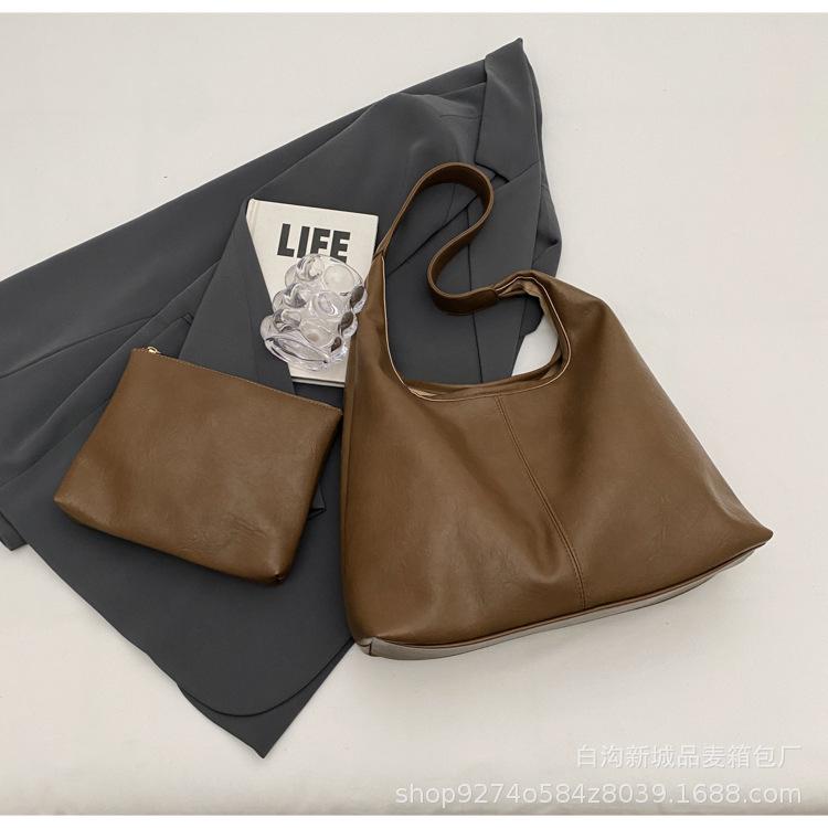 

Fashionable explosive underarm bag women s 2025 new simple texture 100 shoulder bag large capacity retro commuter bag