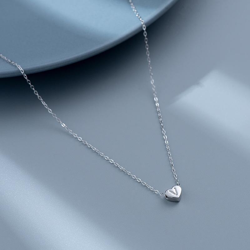 S925 Silver Heart-Shaped Initial Necklace - Korean Style Clavicle Chain with Trendy Peach Heart Design.