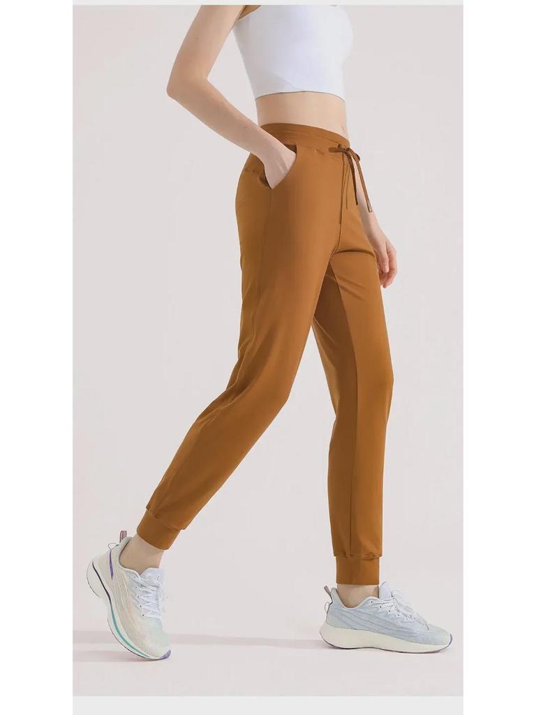 Women's Green Drawstring Quick-Dry Sports Pants: Lightweight, High-End, Straight-Leg Design for Summer.
