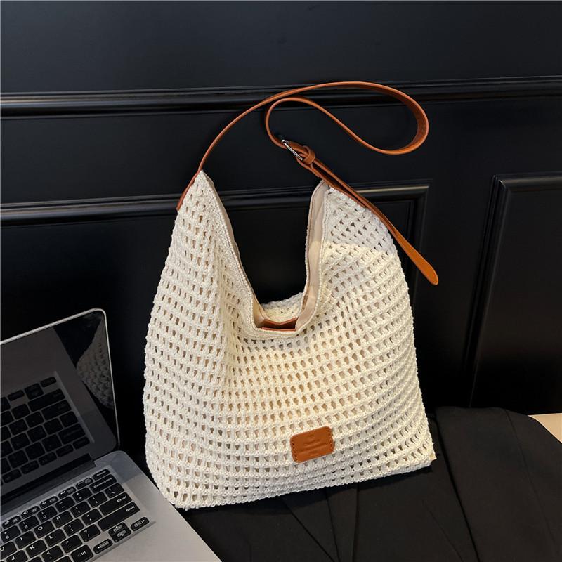 Summer large-capacity underarm bag women's 2025 new hollow woven bag simple shoulder crossbody bucket bag