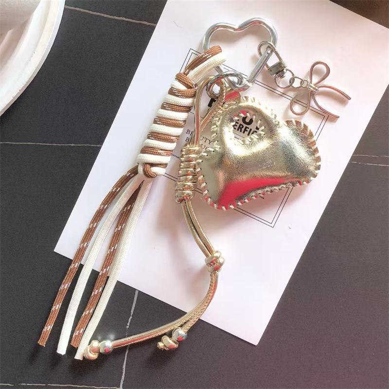 Glossy Leather Small Bag Keychain with Bow & Woven Rope Pendant золотой