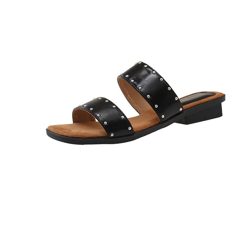 

Французское составное слово с тапочками на плоской подошве большого размера женские весенне-летние новые полые тапочки на низком каблуке модная обувь с заклепками прилив 40