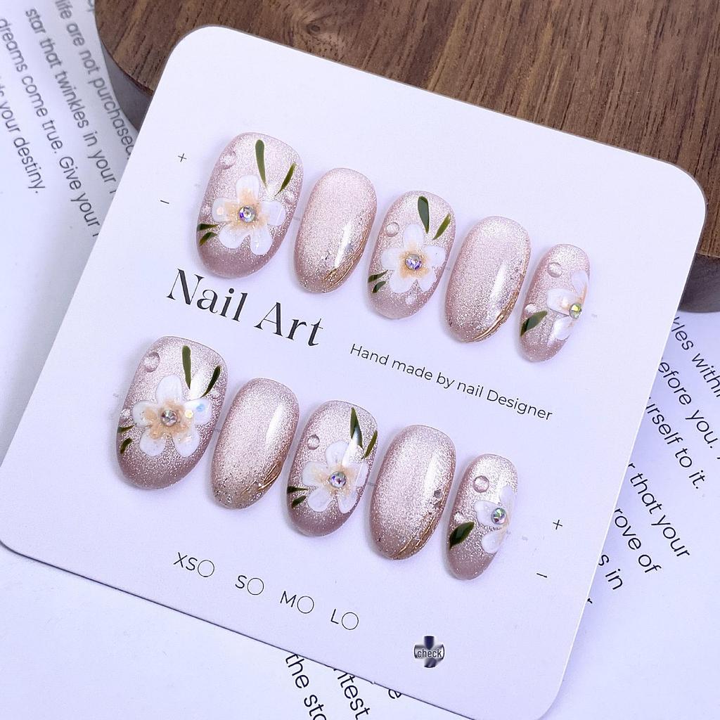 Hot-Selling Hand-Painted Floral Cat Eye Nail Tips - Ice Transparent Nude, Gentle Style Wearable Nails.