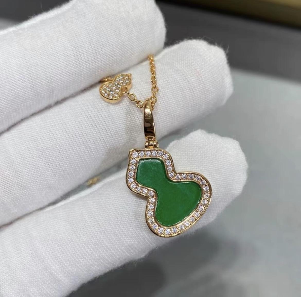 

Elegant Gourd Necklace: 925 Sterling Silver with 18K Rose Gold, White Mother-of-Pearl, and Red Chalcedony Pendant