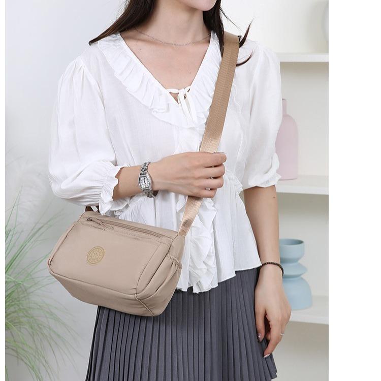 Borsa a tracolla da donna multi-tasche