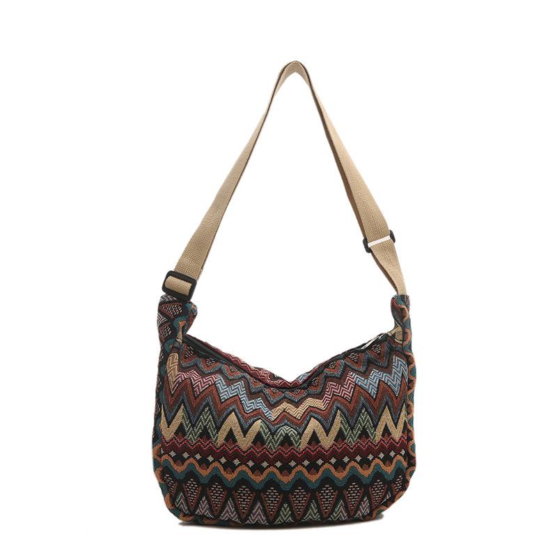 

Female 2026 New Crossbody Bag Large Capacity Canvas Shoulder Bag Versatile College Student Commuter Bag Dumplings коричневий