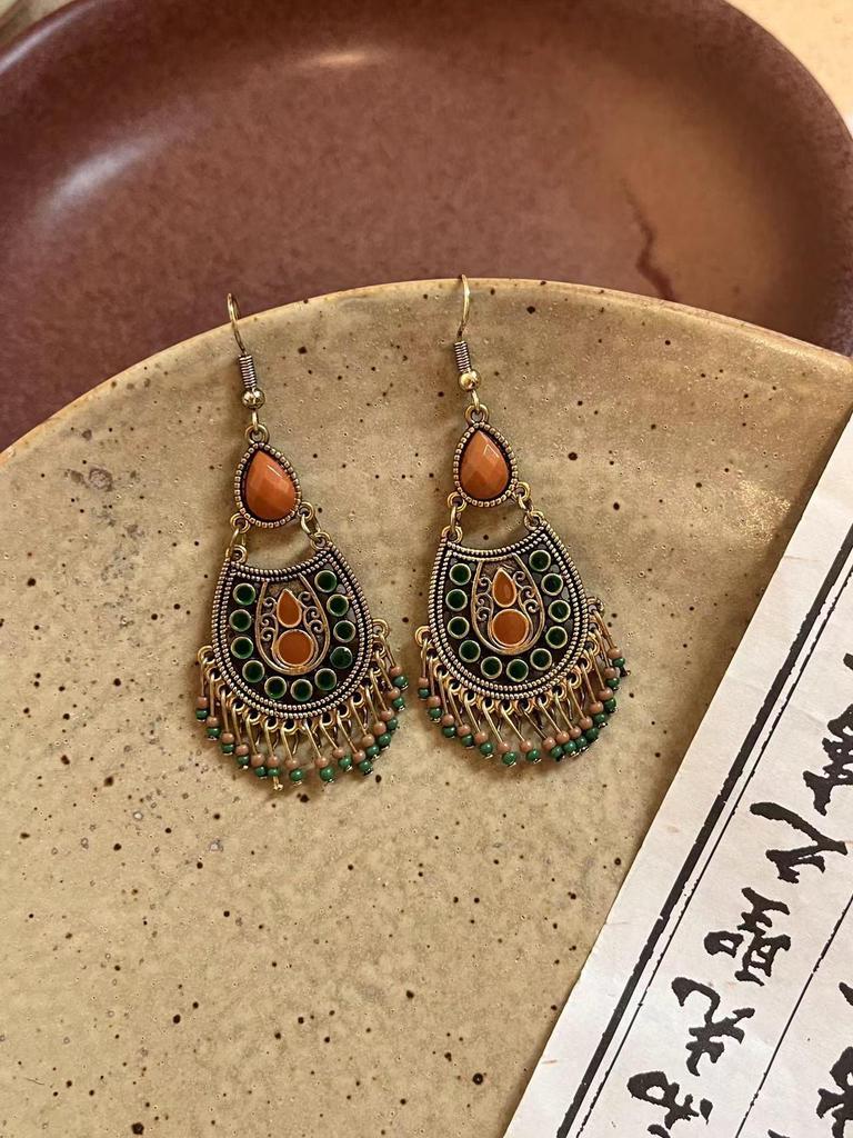 Retro Ethnic Bell Tassel Earrings: Exquisite, Fashionable Dangle Design with Light Luxury Appeal.