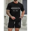 Vielseitiges Alltags-Outfit für Jungen: Rosa und Schwarz gestreiftes T-Shirt und Shorts, bequemes zweiteiliges Set zum Ausgehen