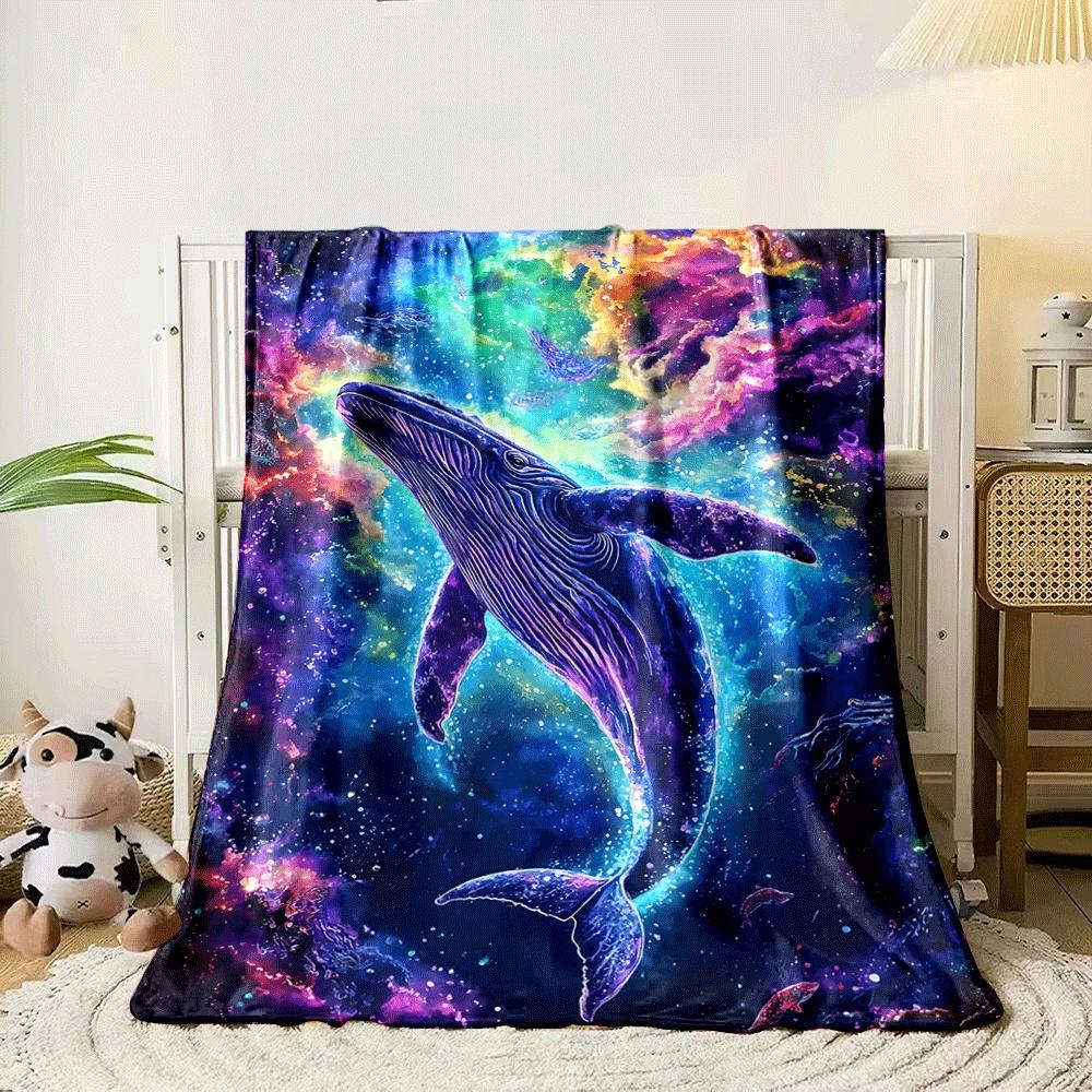 A cosmic blue whale surrounded by vibrant, colorful nebula swirls. for all seasons blanket lunch break throw gift 80cm x 120cm