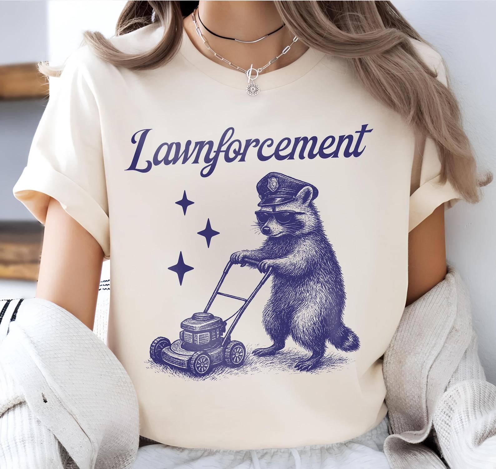 lawnforcement - unisex t shirt, funny raccoon t shirt, silly t shirt, weird graphic tee, vintage raccoon tee, meme t shirt, unhinged T-Shirt L