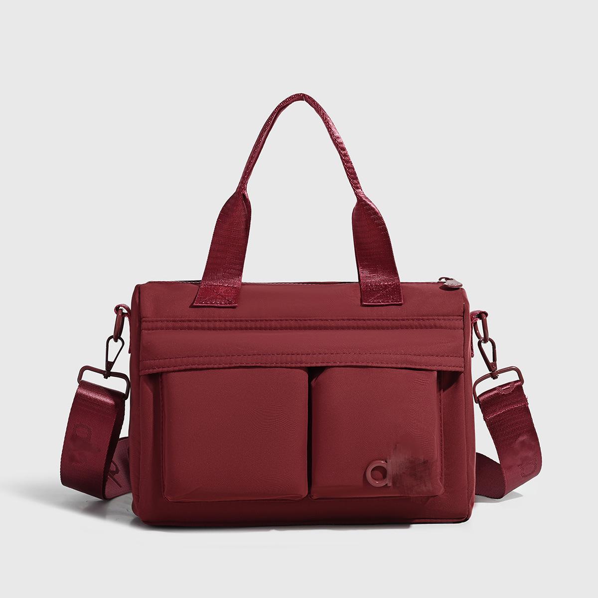 

Unisex Versatile Nylon Crossbody Bag - Niche Fashion for Business and Commuting 28*21*9cm червоний