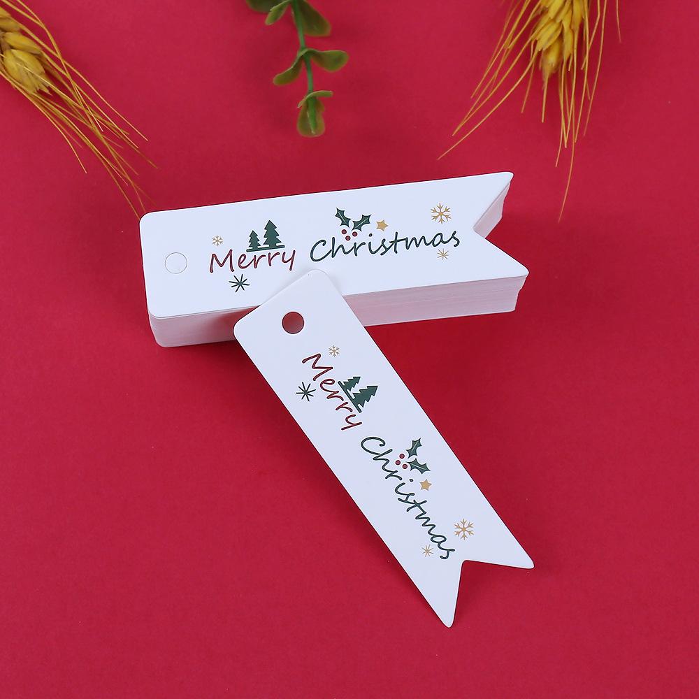 

100pcs Matte Finish Christmas Gift Tags with String - Holiday Present Labels with Merry Christmas Lettering Design 7X2 CM
