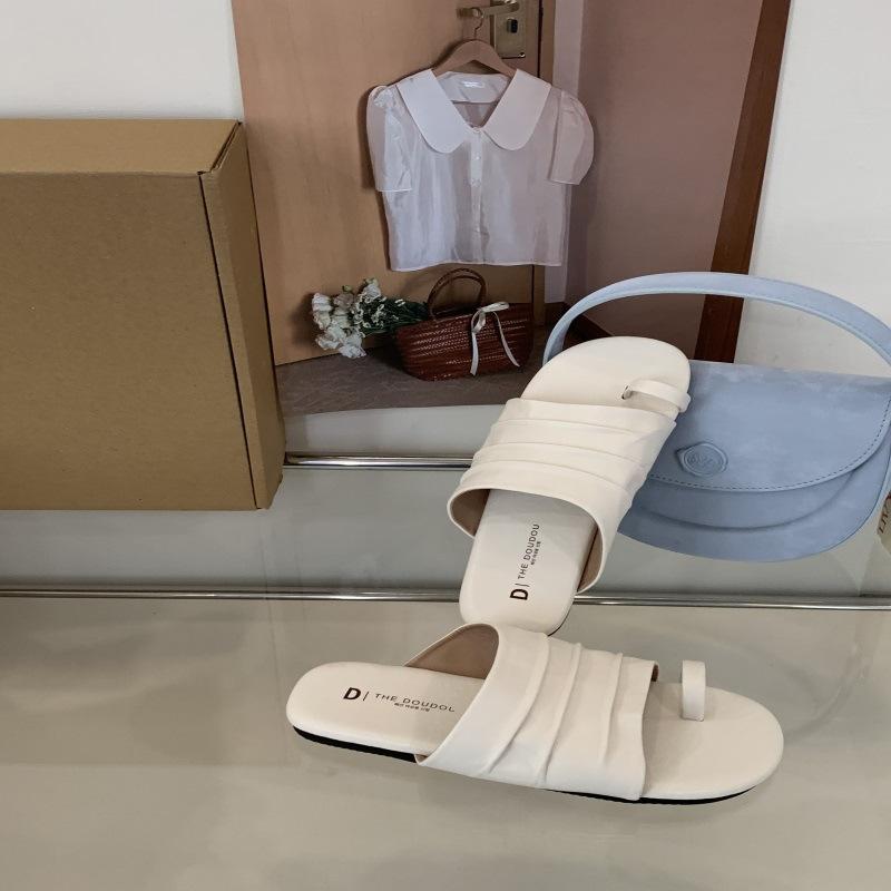 Spring and summer women's outer wear Roman women's shoes one-word seaside beach sandals design sense niche flat-bottomed pinch slippers