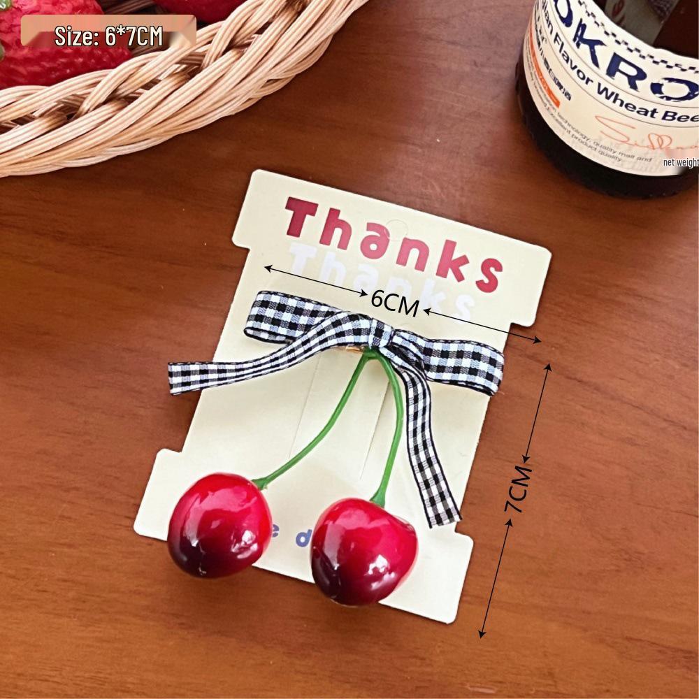 

Шпилька для волосся з клітчатим бантом та вишнею та гумка - Ніжний, міцний, універсальний аксесуар для волосся