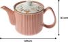 This lightweight teapot features a hand-painted floral lid, a 10cm diameter, and a 470ml capacity in a lovely pink. It includes a super-fine