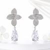 Elegant Zircon Floral Petal Pendant Earrings: Fashionable Four-Leaf Clover Design with Diamond Accents, Perfect for Any Occasion.