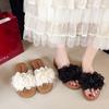 Versatile outer wear flower beach cool slippers women's 2025 summer new beautiful flat flat one-word shoes go out